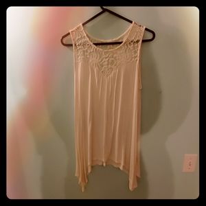 Lace top tank with 'high-low' cut sides